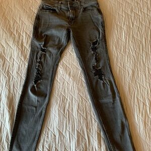 Hollister Black Skinny Jeans with Edgy Distressing